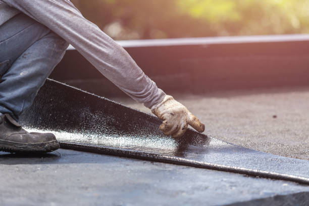 Professional Basement Waterproofing technician working in Bushton, KS